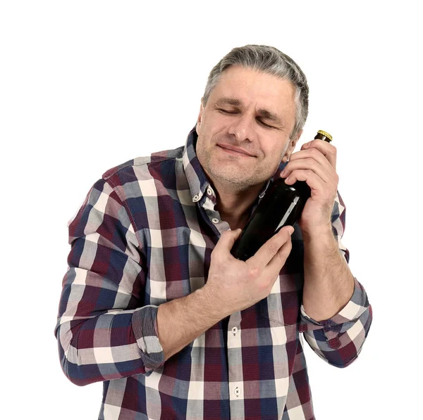 Portrait of happy mature man with bottle of beer on white background — Stock Photo, Image