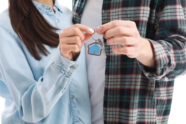 Young couple with key from their new house, closeup — Stock Photo, Image