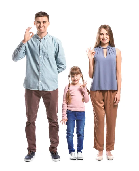 Глухонемая семья использует язык жестов на белом фоне — стоковое фото