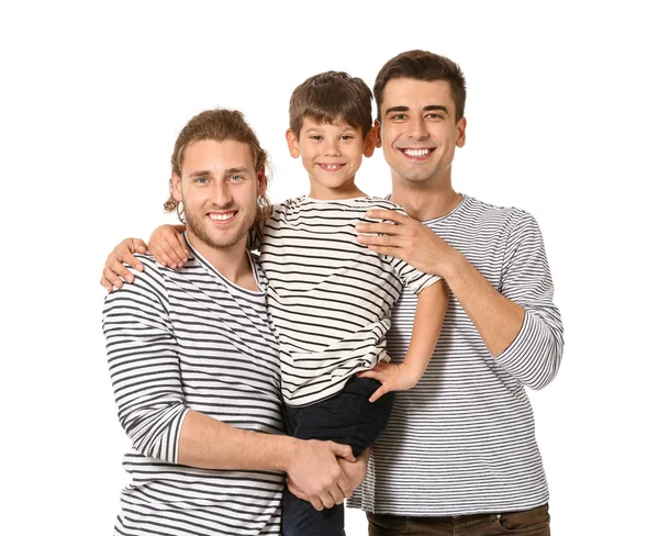 Happy gay couple with adopted child on white background — Stock Photo, Image