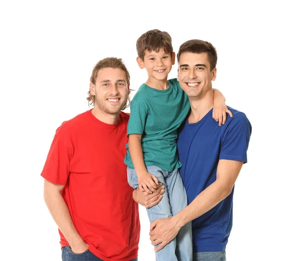 Happy gay couple with adopted child on white background — Stock Photo, Image