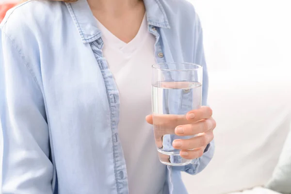 Woman with glass of fresh water at home, closeup — Stock Photo, Image