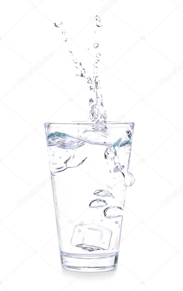 Glass of fresh water with splash on white background