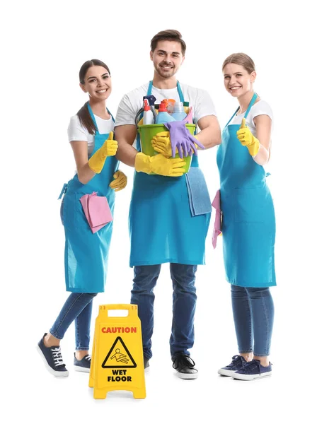 Equipe de zeladores em fundo branco — Fotografia de Stock