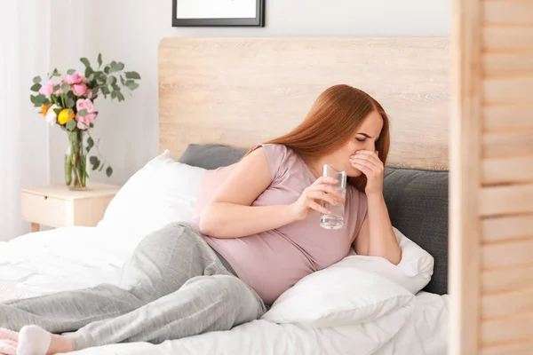 Young pregnant woman suffering from toxicosis at home — Stock Photo, Image