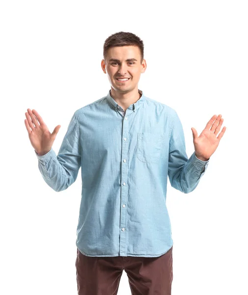 Joven hombre mudo sordo usando lenguaje de señas sobre fondo blanco —  Fotos de Stock