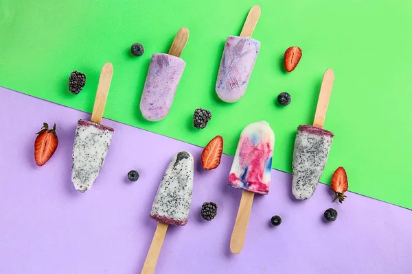 Different fruit ice cream on color background — Stock Photo, Image