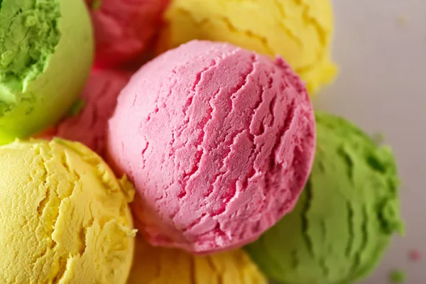 Balls of colorful tasty ice cream, closeup — Stock Photo, Image