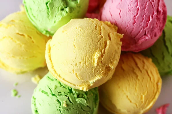 Balls of colorful tasty ice cream, closeup