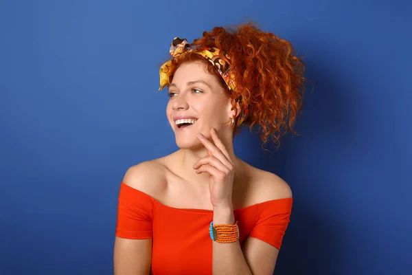 Beautiful redhead woman on color background — Stock Photo, Image