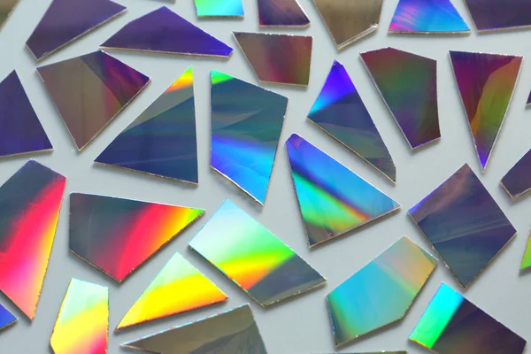 Shiny iridescent splinters on white background — Stock Photo, Image