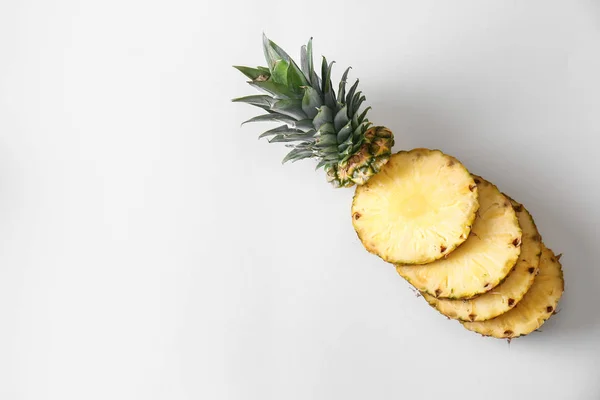 Ripe cut pineapple on white background — Stock Photo, Image