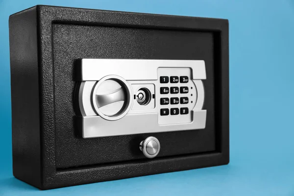 Modern safe on color background — Stock Photo, Image