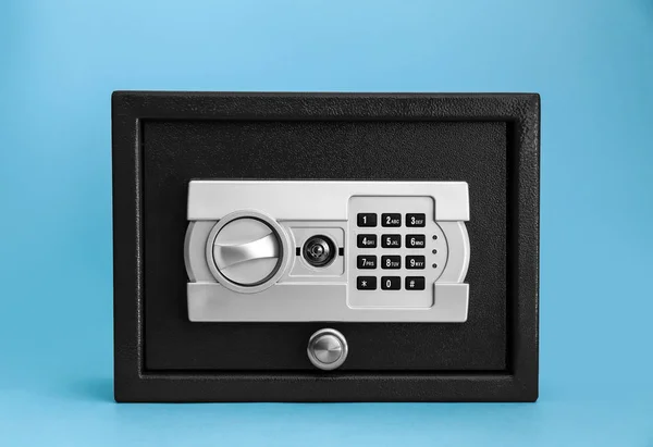 Modern safe on color background — Stock Photo, Image