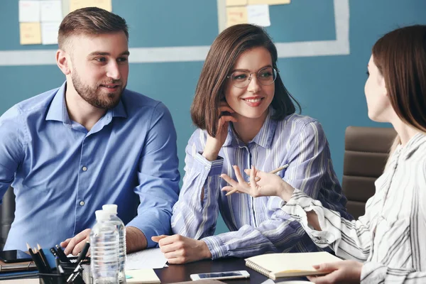 Young business people at meeting in office — Stock Photo, Image