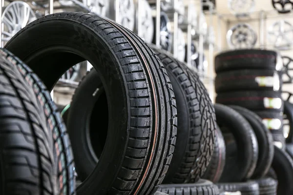 Car tires in automobile store — Stock Photo, Image