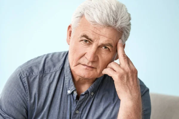 Portrait of sad senior man at home — Stock Photo, Image