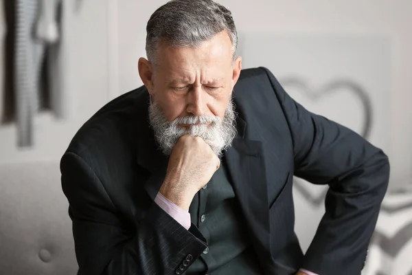 Portrait of sad senior man at home — Stock Photo, Image