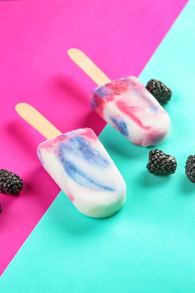 Tasty berry ice cream on color background — Stock Photo, Image