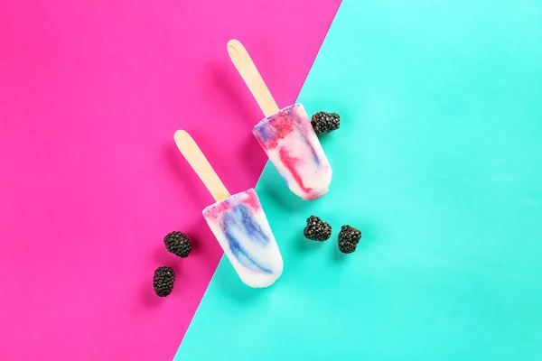 Tasty berry ice cream on color background — Stock Photo, Image