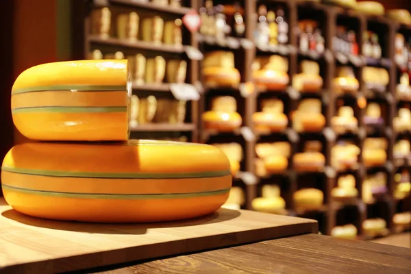 Delicious cheese on counter in shop