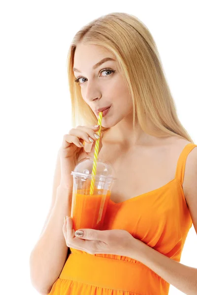 Beautiful young woman with fresh juice on white background — Stock Photo, Image