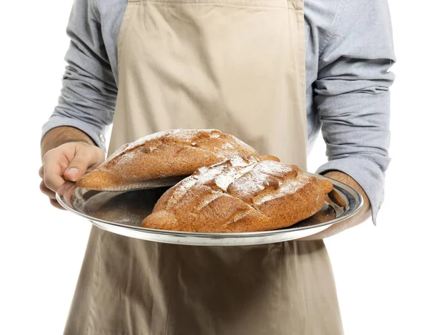 Baker with fresh bread on white background, closeup — Stock Photo, Image