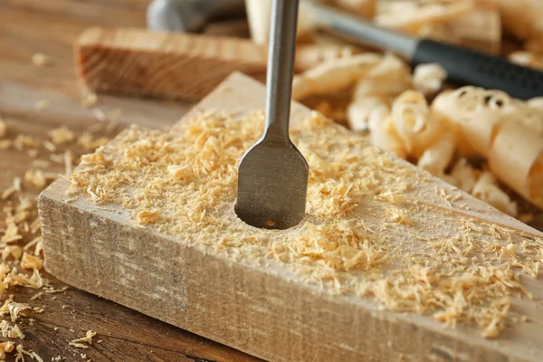 Drilling of wooden plank, closeup — Stock Photo, Image