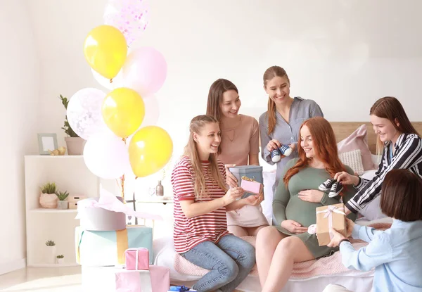 Beautiful pregnant woman and her friends at baby shower party — Stock Photo, Image