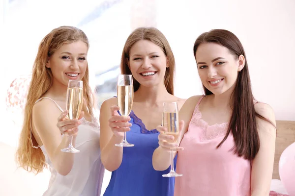 Beautiful young women drinking champagne at hen party — Stock Photo, Image