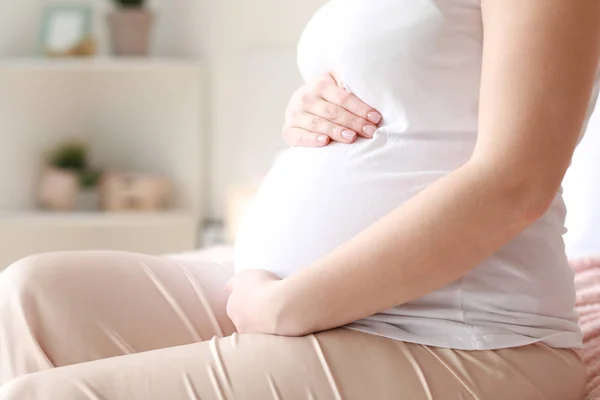 Beautiful pregnant woman at home, closeup — Stock Photo, Image