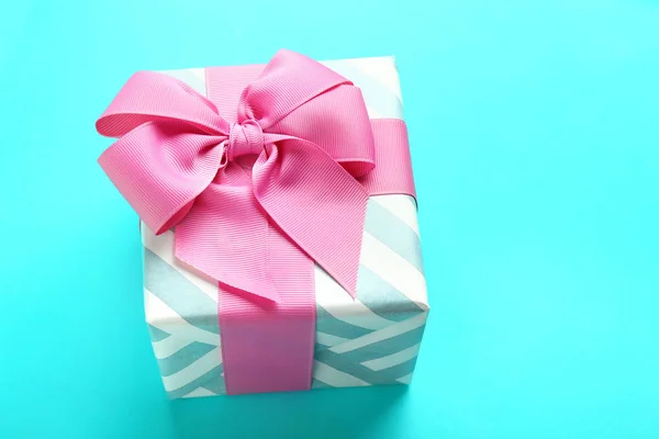 Beautiful gift box on color background — Stock Photo, Image