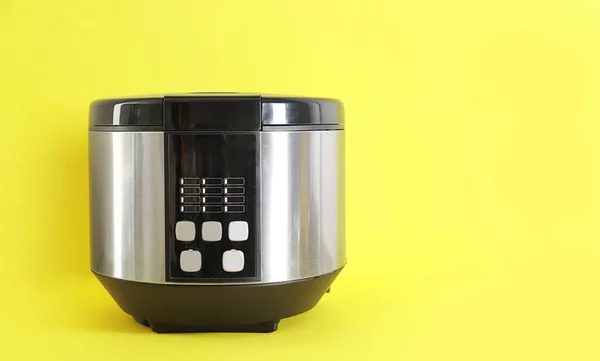 Modern multi cooker on color background — Stock Photo, Image