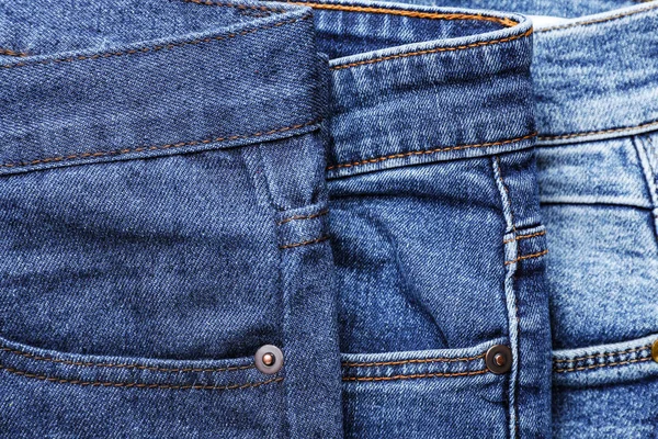 Verschiedene stylische Jeans, Nahaufnahme — Stockfoto