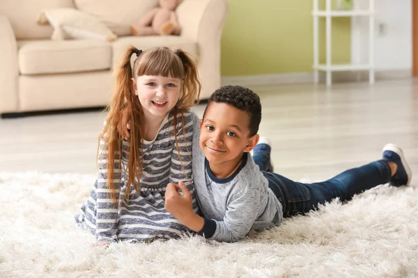 Cute adopted children in their new home — Stock Photo, Image