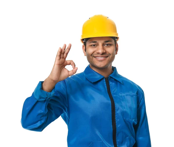 Trabajador guapo en hardhat mostrando OK sobre fondo blanco —  Fotos de Stock