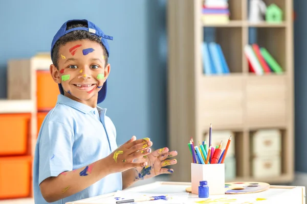 Cute African-American boy painting at home — Stock Photo, Image