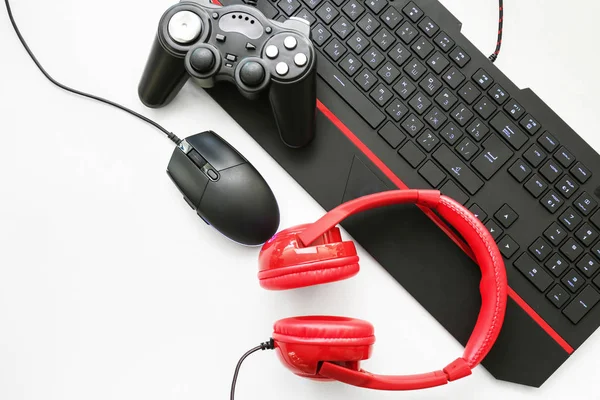 Modern gaming accessories on light background