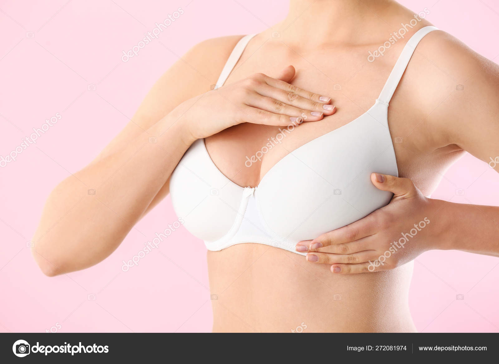 Young woman with beautiful breast on white background Stock Photo