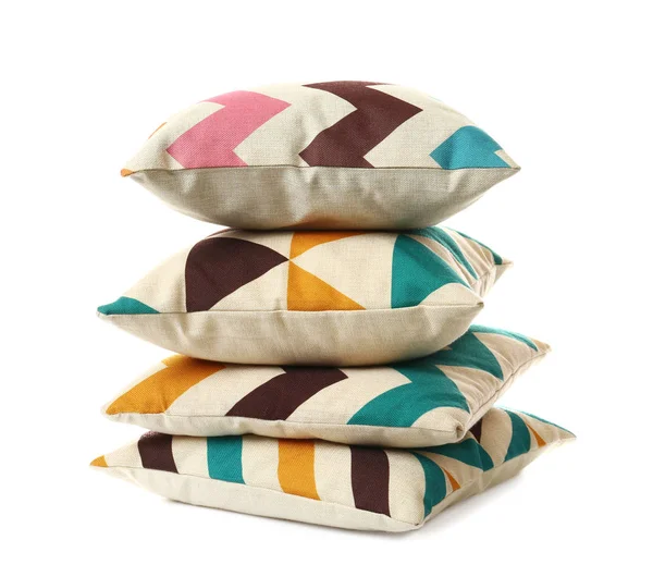 Montón de almohadas suaves sobre fondo blanco — Foto de Stock