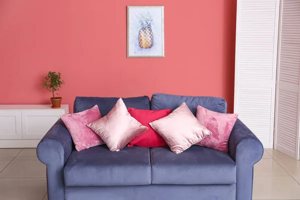 Sofa with soft pillows in modern room — Stock Photo, Image