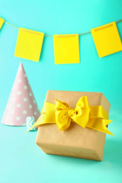 Beautiful Birthday gift box and decor on color background — Stock Photo, Image