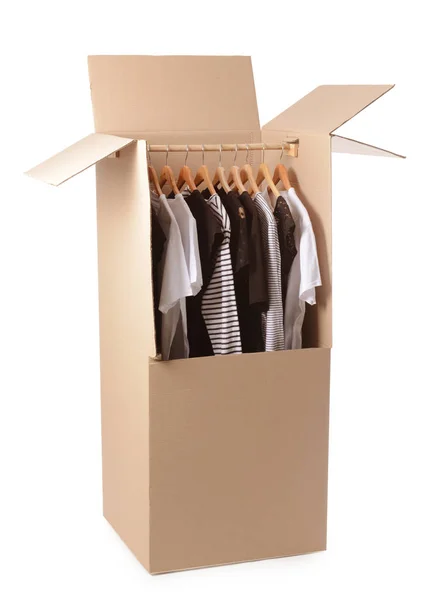 Wardrobe box with clothes on white background