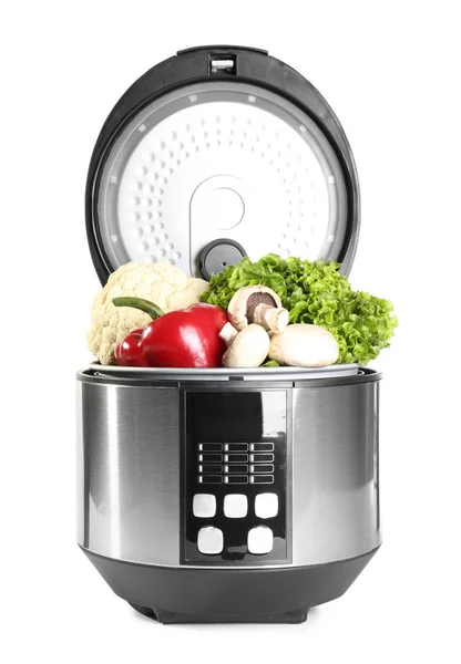 Modern multi cooker with vegetables on white background — Stock Photo, Image