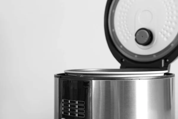 Modern multi cooker on light background, closeup — Stock Photo, Image