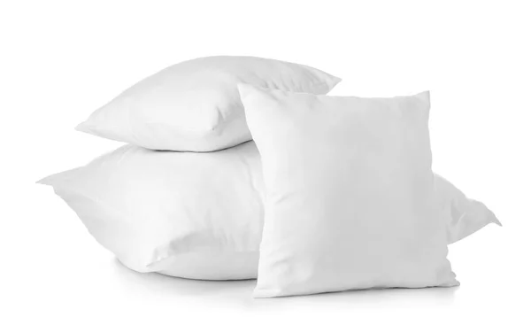 Мягкие подушки на белом фоне — стоковое фото