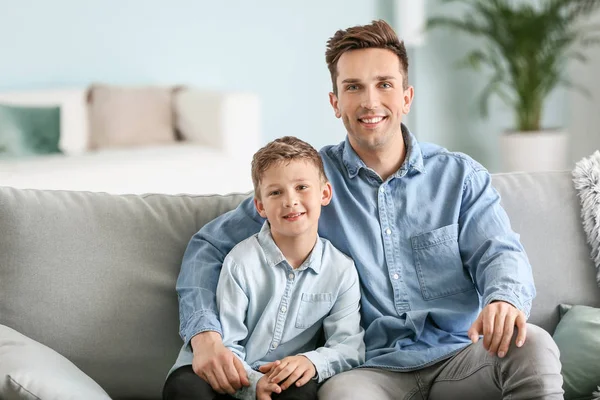 Portrait of happy father and son at home — Stock Photo, Image