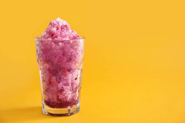 Glass with tasty shaved ice on color background — Stock Photo, Image