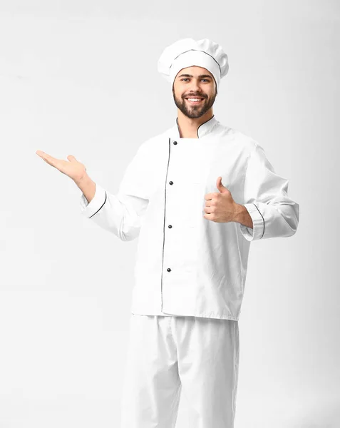 Przystojny mężczyzna szef kuchni na białym tle — Zdjęcie stockowe