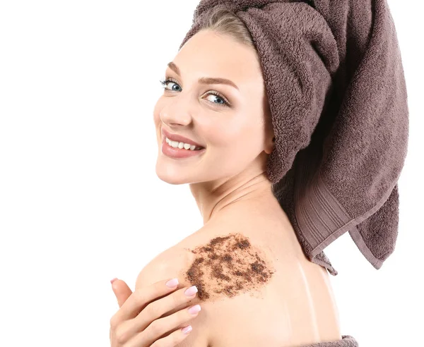 Young woman with body scrub on her body against white background — Stock Photo, Image